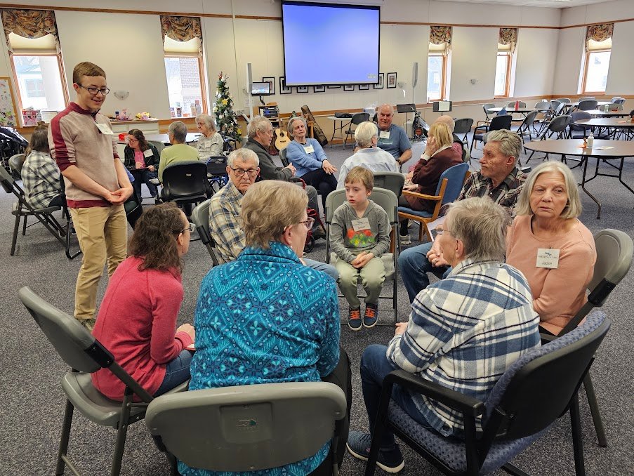 Laurie Van Beek, Program Director of Friends at the Lake, with program participants